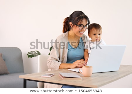 Zdjęcia stock: Mother On Laptop Computer