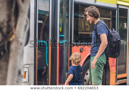 Stock photo: Father And Son Going To Go By Bus In Hong Kong
