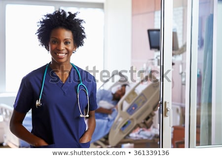 Zdjęcia stock: Portrait Of Two Female Nurses With Doctor