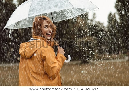 ストックフォト: A Woman In The Rain