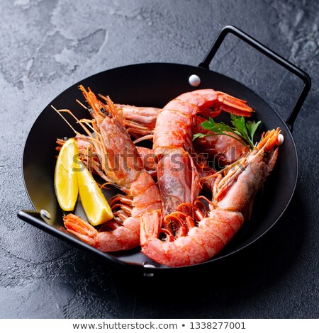 Foto stock: Fresh Cooked King Prawns In A Dish