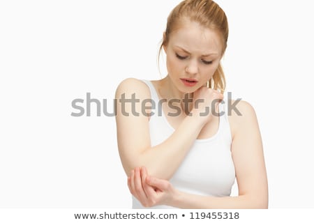 [[stock_photo]]: Fair Haired Woman Touching Her Elbow