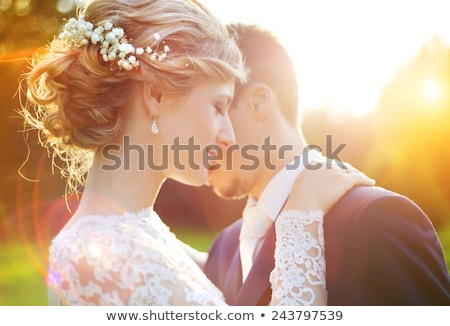 ストックフォト: Romantic Bride And Groom Embracing Outdoors