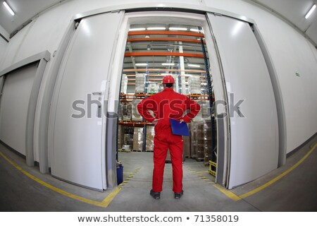 Stock fotó: Worker In Warehouse Doorway