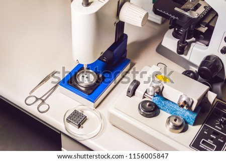 Zdjęcia stock: Ultrasonic Cutter System And Precision Micrometer Grinder Polishing Machine