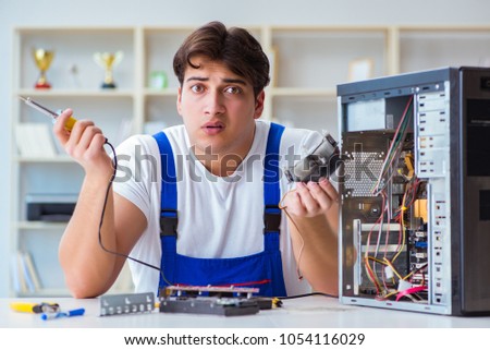 [[stock_photo]]: Computer Hardware Repair And Fixing Concept By Experienced Techn