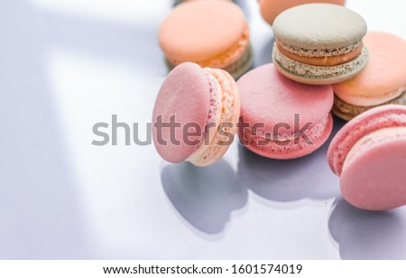 Stockfoto: French Macaroons On Blue Background Parisian Chic Cafe Dessert