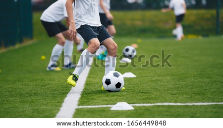 Junior Football Match Boys Kicking Soccer Match On Grass Sports Stockfoto © matimix