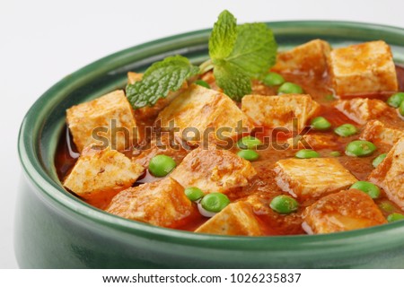 Stock fotó: Paneer Butter Masala Or Cottage Cheese Curry With Nan Or Roti Popular Indian Lunchdinner Menu