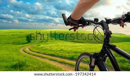 Foto stock: Cyclists Riding On Country Road