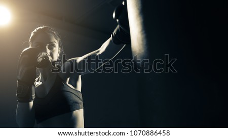 Stok fotoğraf: Young Woman Boxing And Training