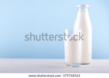ストックフォト: Cookies Milk Bottle On A White Wooden Background And The Heart