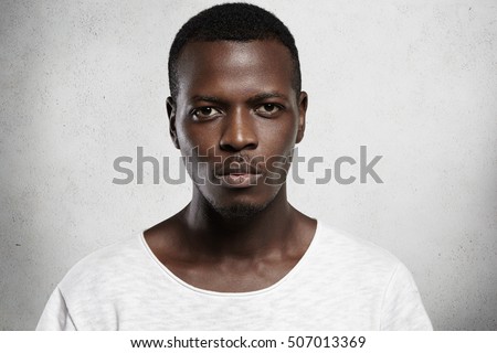 Stock photo: Close Up Portrait Of A Serious Pensive Man