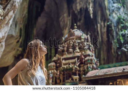 Zdjęcia stock: Young Woman In The Background Of Batu Caves Near Kuala Lumpur Malaysia Traveling With Children Co