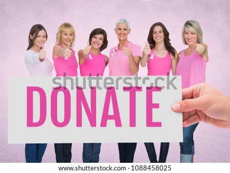 [[stock_photo]]: Donate Text And Hand Holding Card With Pink Breast Cancer Awareness Women