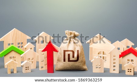 Stockfoto: Israeli Shekel Money Bag With Red Up Arrow And Residential Building Recovery And Growth In Property