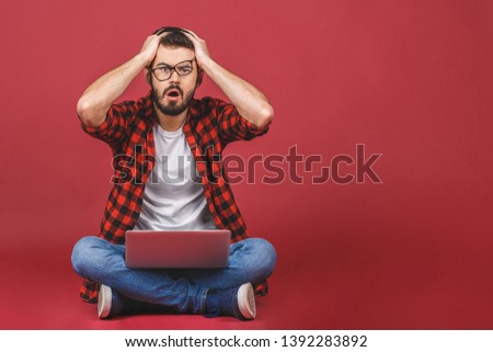 [[stock_photo]]: Photo Of Handsome Tired Businessman Sitting On The Floor Relaxi