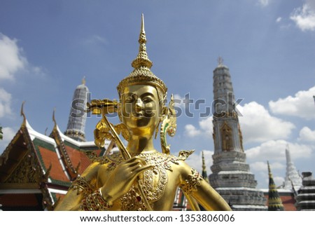 Foto stock: A Kinaree A Mythology Figure Is Watching The Temple In The Gra