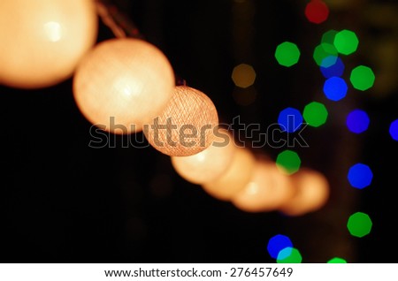 Foto stock: Garland Background With Ball Lights On The Folds Of The Fabric I