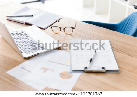 Stock foto: Top View Of Office Stuff Lying On Wooden Table Laptop Clipboar