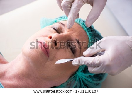 ストックフォト: Woman At Cosmetic Surgery Clinic