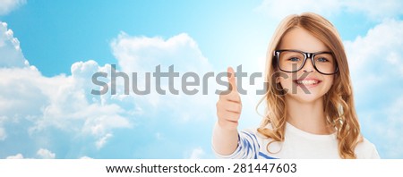 Сток-фото: Smiling Cute Little Girl With Black Eyeglasses Over White Backgr