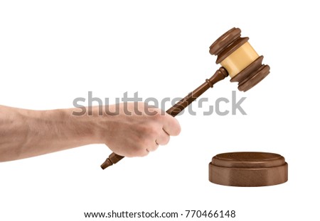 Stock photo: Male Lawyer Or Judge Hands Striking The Gavel On Sounding Block