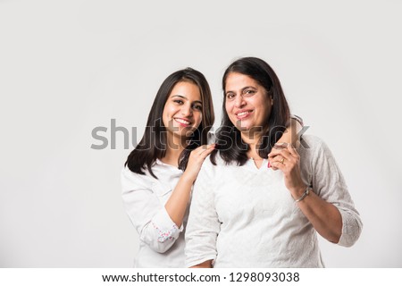 Stockfoto: Pretty Young Mother And Daughter In Casualwear Standing On Escalator