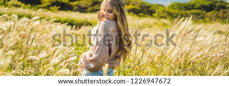 Сток-фото: Young Beautiful Woman In Autumn Landscape With Dry Flowers Wheat Spikes Fashion Autumn Winter Su