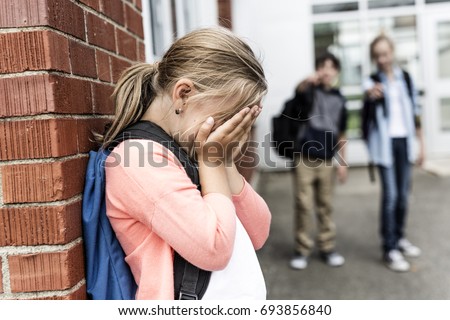 Stock fotó: Friends At A Playground Bullying About Other Girl In Foreground