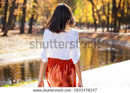 Foto d'archivio: Beautiful Woman With Long Brown Hair Closeup Portrait Of A Fashion Model Posing At Studio