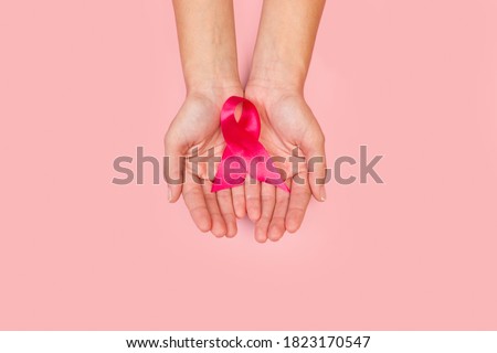 Stock photo: Directly Above View Of Pink Breast Cancer Awareness Ribbon With Safety Pin