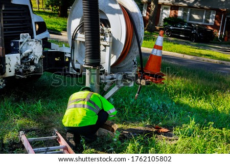 Foto stock: Plumber And Dirty Toilet Cleaning Pipes Repair Of Plumbing Ve