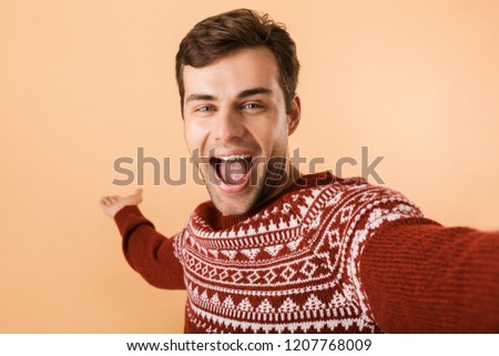 Stock fotó: Image Of Handsome Man 20s With Bristle Wearing Knitted Sweater P