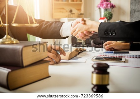 Stock photo: Lawyer In Office Counseling And Giving Advice About Legal Legis