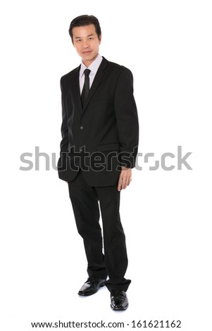 Stock photo: Full Length Shot Of Male Entrepreneur In Formal Suit Medical Mask Stands In Urban Train During Dis