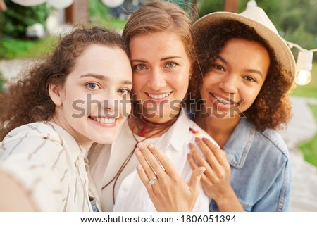 ストックフォト: Multi Ethnic Group Of Women Relax Together During Summer Travel Inside The Camper Van