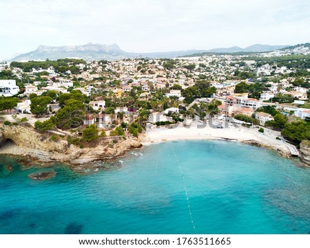 Stock foto: Distant View Rocky Coves Sandy Beach Tiny Bay Of Benissa Turq