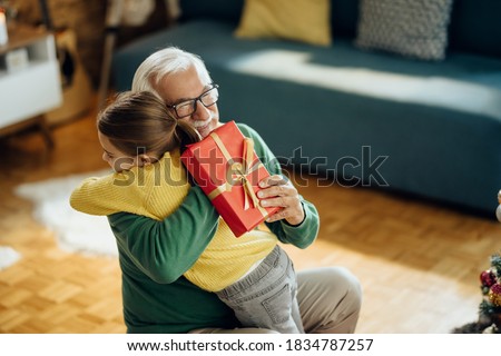 [[stock_photo]]: Receiving A Present At Christmas