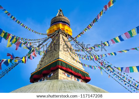 Сток-фото: Buddhist Shrine Boudhanath Stupa With Pray Flags Over Blue Sky