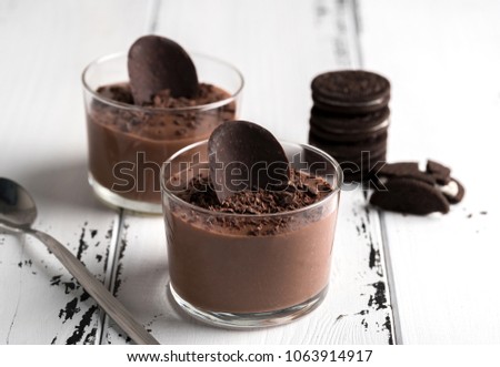 Stock fotó: Glass With Chocolate Mousse Dessert Served On A Wooden Surface