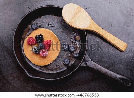 Сток-фото: Home Made Pancakes With Berries On Metal Frying Pan Decorated Wi