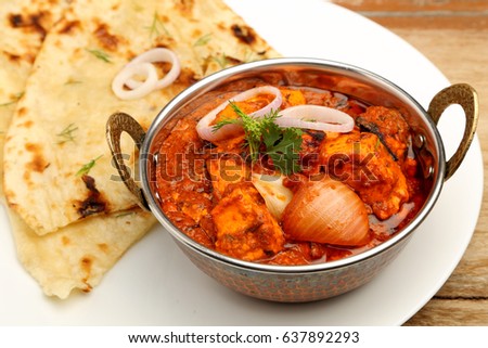 Stock fotó: Indian Food Or Indian Curry In A Copper Brass Serving Bowl With Nan Bread Or Roti