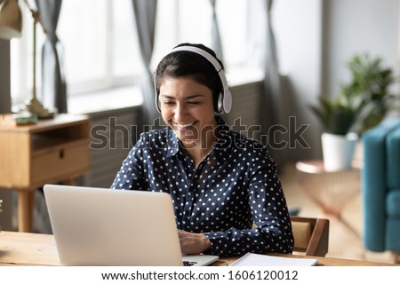 Stock foto: Young Woman Teaches A Foreign Language Or Learns A Foreign Language On The Internet On Her Balcony A