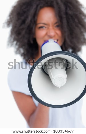 Stok fotoğraf: Megaphone Held By A Young Woman Shouting Against A White Background