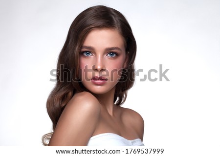 Foto stock: Close Up Portrait Of Beautiful Young Woman With Curly Long Hair