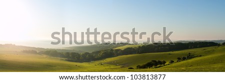 ストックフォト: Vibrant Sunrise Over Countryside Landscape