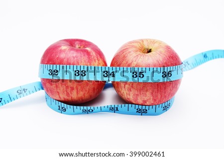 Zdjęcia stock: Tape Measure Wrapped Around Fruits Isolated On White Background