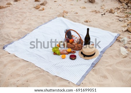 Stockfoto: Picnic On The Beach At Sunset In The White Plaid Food And Drink