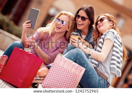 Stock foto: Sale Fashion Consumerism And People Concept - Happy Young Woman With Shopping Bags Choosing Clothe